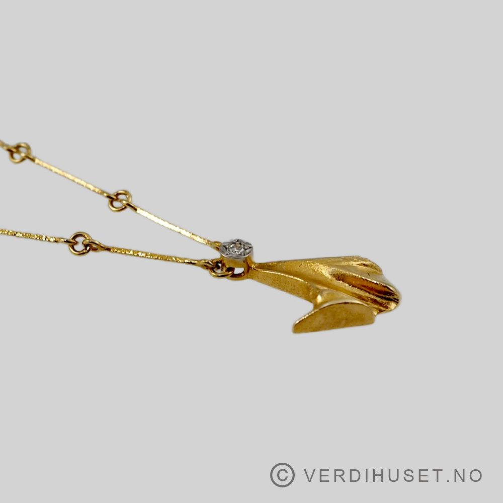 Halssmykke i 18 K gull med diamant