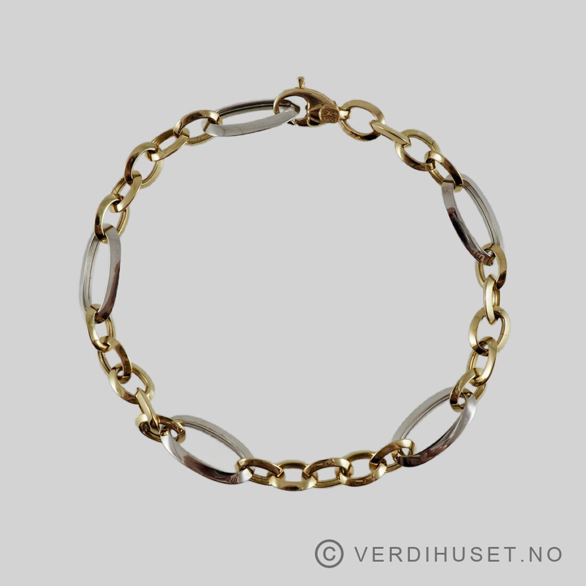 Armbånd i 14 K hvitt og gult gull