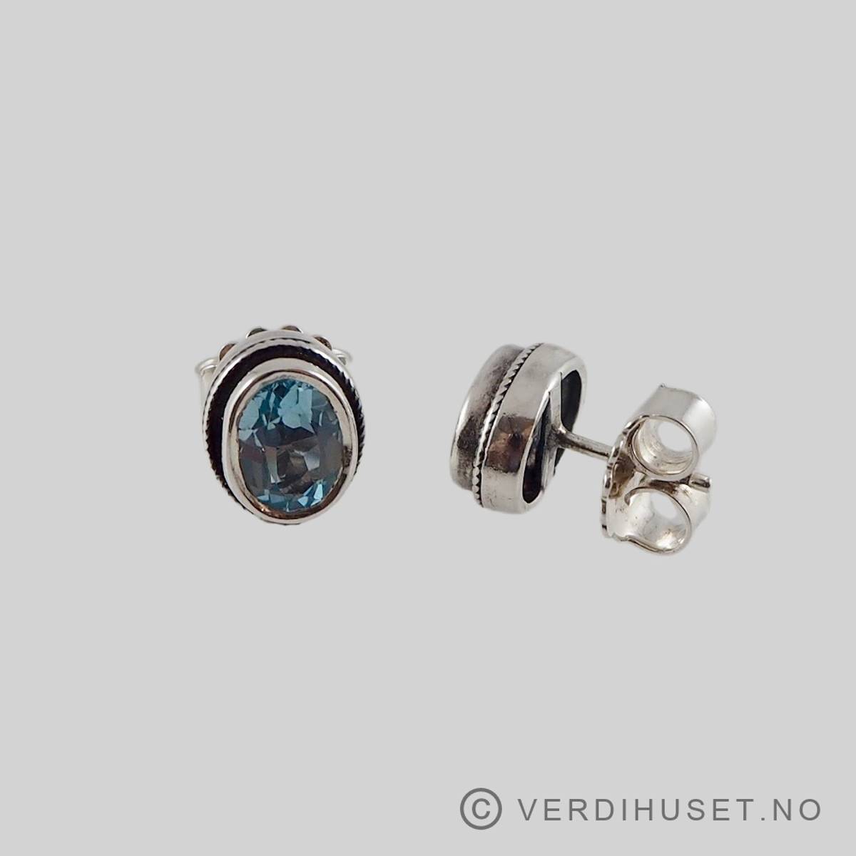 Ørepynt i sølv med blå sten - 