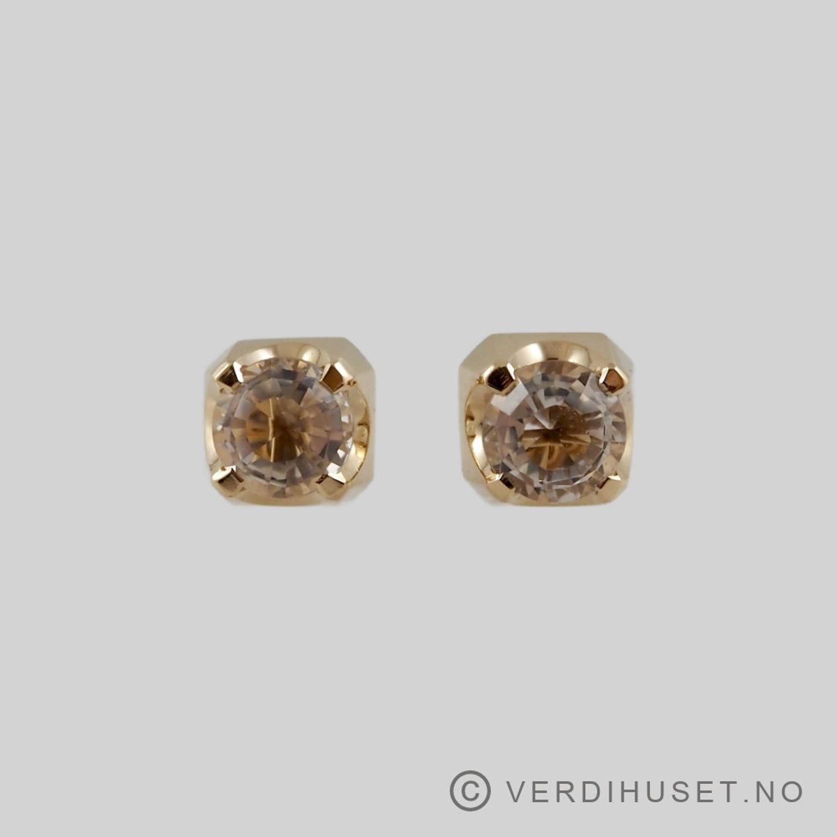 Ørepynt i 14 K gull med blank sten