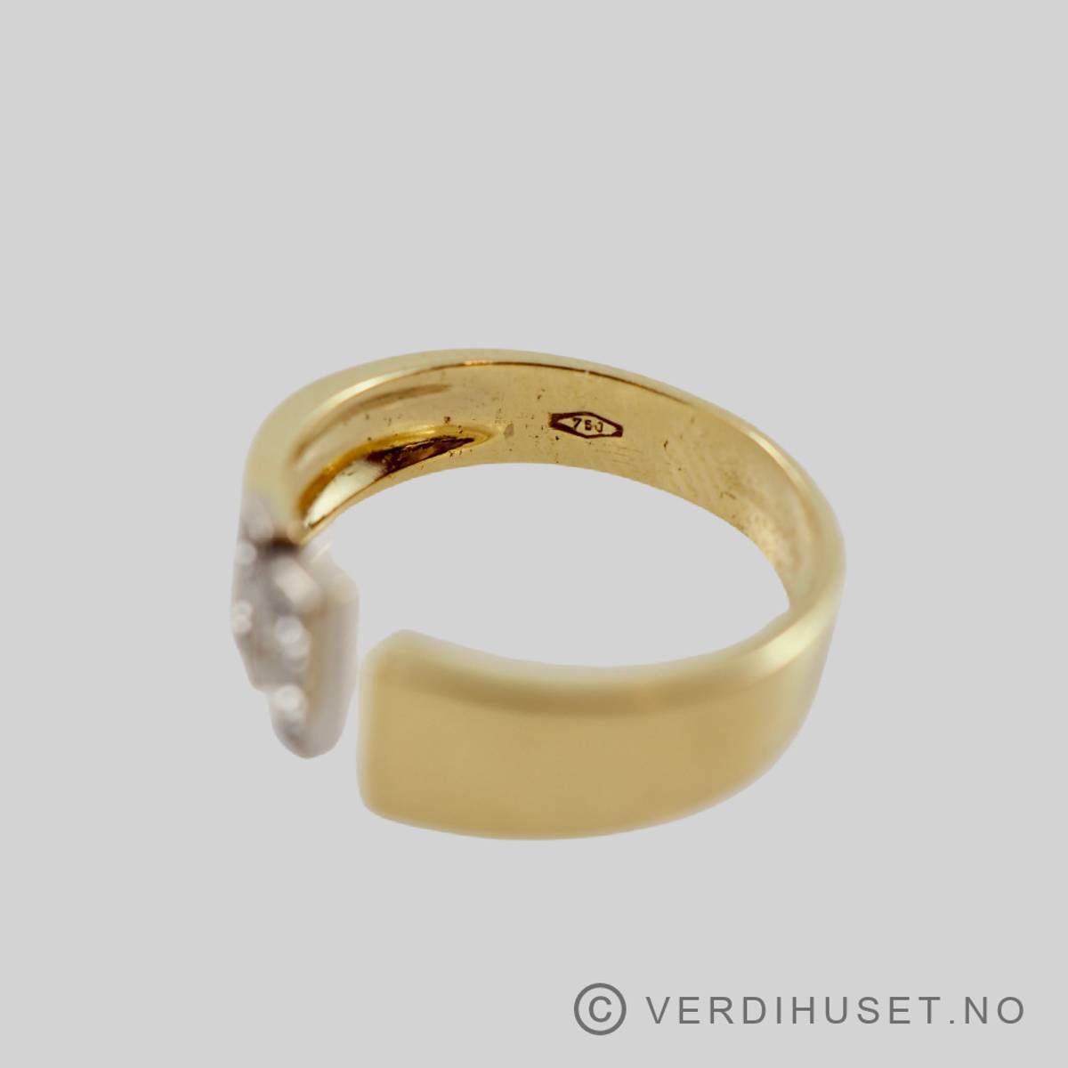 Ring i 18 K gull med blanke stener